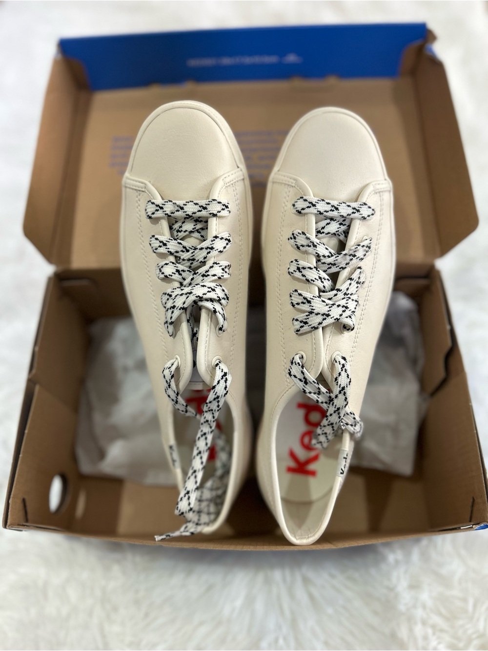 ** New and never worn **
Keds Cream Lace-Up Sneakers with Black-Patterned Laces